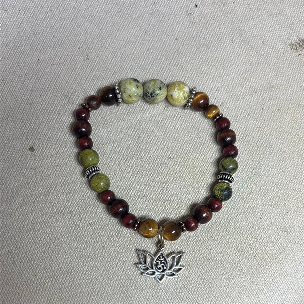 Elegant Beaded Bracelet with Silver Charm